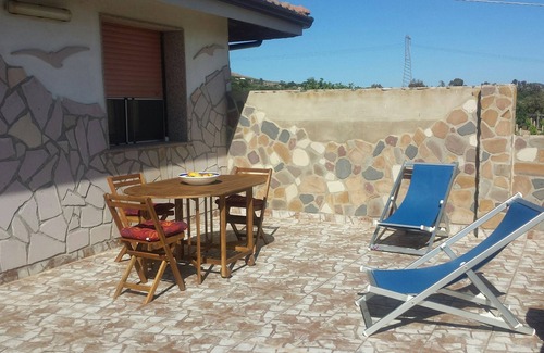 Gonnesa Apartment | Holiday feeling in a quiet area apartment on olive grove with Wi-Fi!