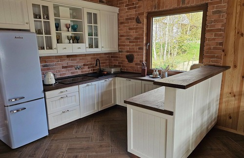 Szczecinek House | Holiday Home by Lake Wierzchowo with Private Beach