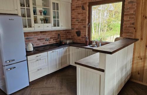 Szczecinek House | Holiday Home by Lake Wierzchowo with Private Beach