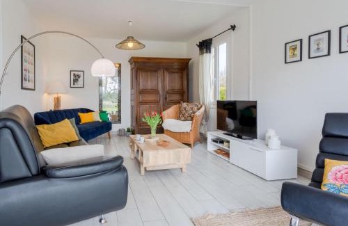 Anneville-sur-Mer House | Holiday Home Les Cordylines by Interhome