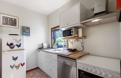 Beijos House | Holiday Home 'Casa De Andrães Magnolias' with Shared Pool, Wi-Fi and Air Conditioning