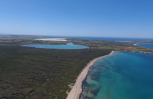 Torre del Pozzo House | Holiday home with sea view on the beach of Is Arenas and Torre del Pozzo 300 meters from the sea sho