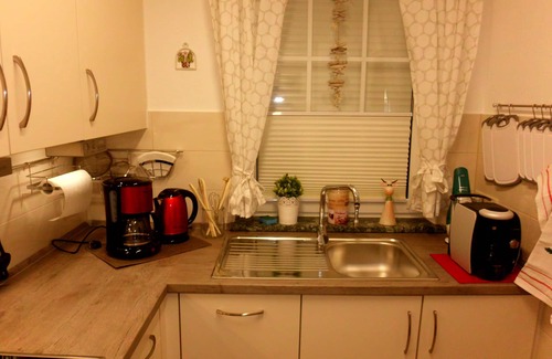 Dornumersiel House | HOLIDAY HOUSE "NORDSEESCHOLLE6" right on the dike - dog welcome-WiFi free of charge