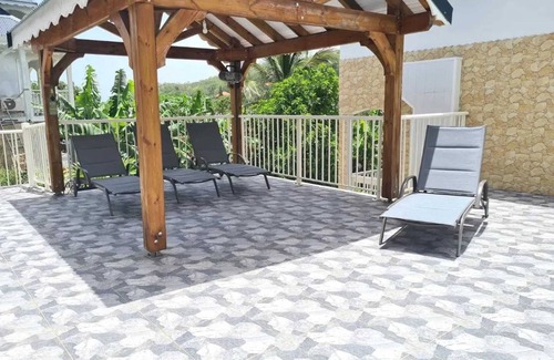 Bas Vent House | Homerez - Spacious House in Deshaies with Shared Pool