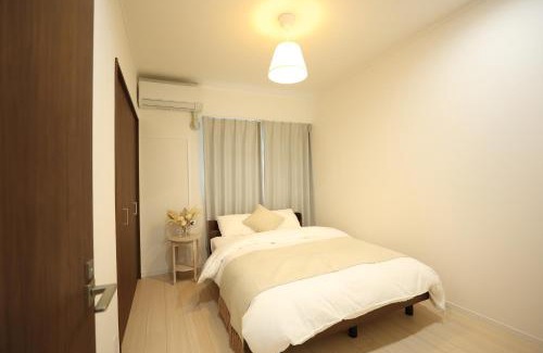 Chinatown Apartment | homey I 横浜中華街の中に位置する120平米一戸建まるごと貸切 I ダブルサイズ寝具8台最大16人 I 元町中華街駅徒歩3分