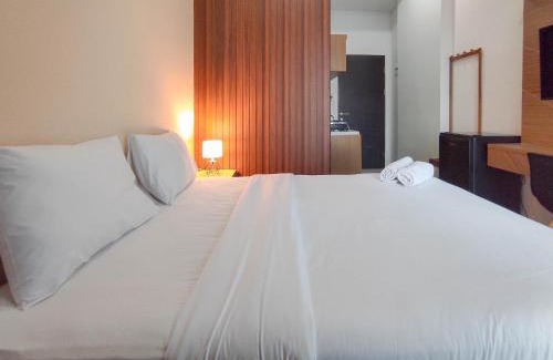 Sidoarjo Apartment | Homey Studio with Easy Pool Access Apartment at Suncity Residence By Travelio
