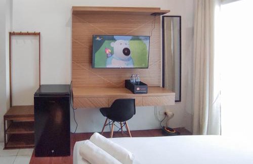 Sidoarjo Apartment | Homey Studio with Easy Pool Access Apartment at Suncity Residence By Travelio