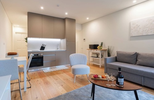 Guimaraes Apartment | HostWise - Sunny Flats w/Balcony