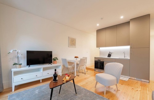 Guimaraes Apartment | HostWise - Sunny Flats w/Balcony