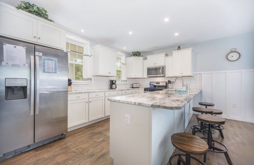 Miami Park House | Hot tub, EV friendly, main floor primary suite with plenty of space.