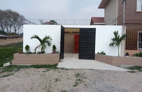 Siguatepeque House | House 2 story 3 planter's at front beige& Brown color