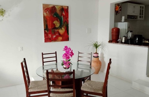 Campeche Norte House | House in front of a small lake in Campeche