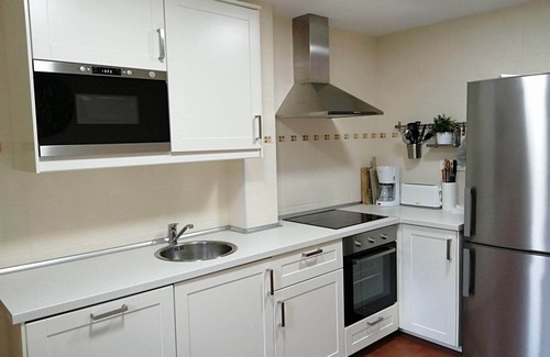 Llamigo House | House with heated pool and beautiful glazed porch