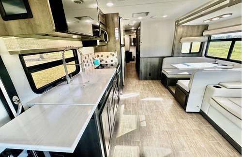 Elgin House | Howdy RV - 2023 Luxury Motor Coach - Sleeps 10