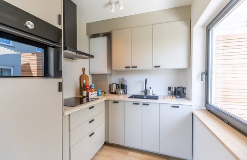 Cadzand-Bad Apartment | Huswell - Charming Apartment with Garden & Parking