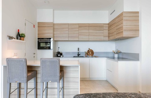 Ostend Apartment | Huswell - Your perfect coastal escape with swimming pool