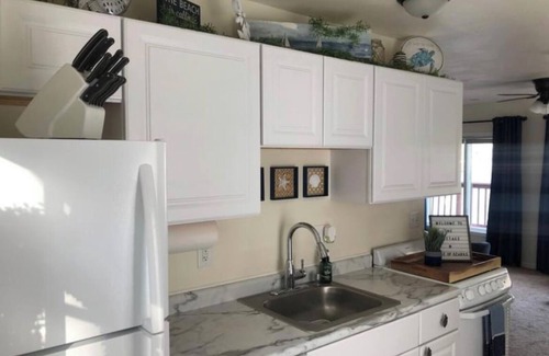 Lake of the Ozarks House | Immaculate 1 Bedroom Cottage Home With Private Covered Dock Near Main Channel!