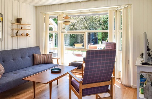 Skibby House | In the cozy cottage area of Vellerup, just a few minutes walk from the fjord, you will find this wel