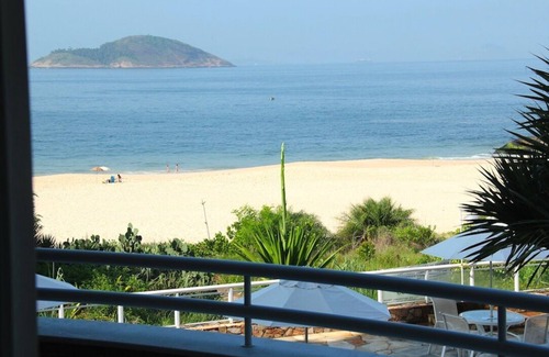 Camboinhas Apartment | INCREDIBLE BEACH FRONT WITH PRIVATE BEACH ACCESS INFINITY POOL BEST AROUND RIO