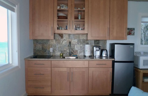 Staniel Cay Cottage | Incredible water views/sunsets.includes golf cart!