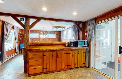 Montgomery Center House | Inviting riverfront home with hot tub on deck & fireplace, near skiing & golf