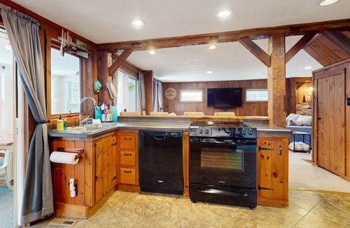 Montgomery Center House | Inviting riverfront home with hot tub on deck & fireplace, near skiing & golf