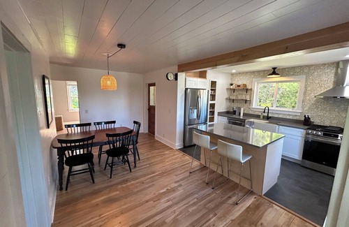 Eveline Township Cottage | Ironton Stone Cottage, walk to Lake Charlevoix beach.