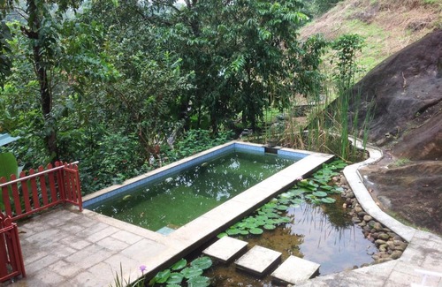 Kunchithanny House | Jade Munnar - Boutique Resort