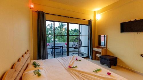 Thoddoo House | Jenyva Inn