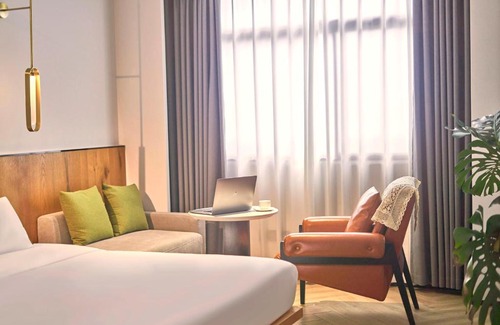 Jianghai Qu Hotel | Jiangmen Sanmuli Hotel-Waihai Bridge in Jianghai High-tech Zone, near Zhongshan Ancient Town Lighting Expo