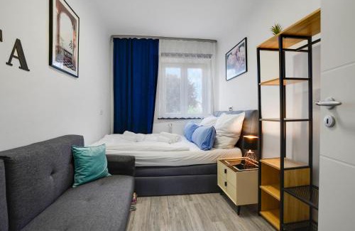 Innenstadt Apartment | KATIES Apartments Augsburg - Zentral - 4 Zimmer - 7 Personen - 2 Parken - Nintendo Switch - DisneyPlus - E-Kamin