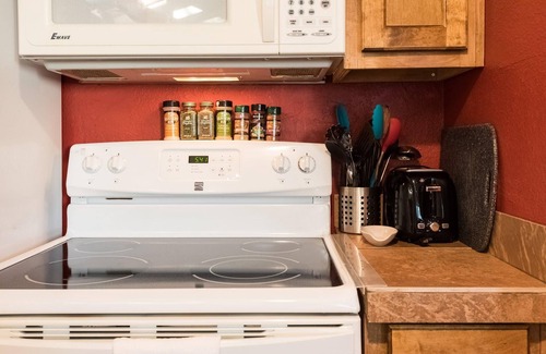 Barton Hills Condo | King bed, view, patio, .33 miles to Barton Springs/Zilker Park, @2 miles to DT!