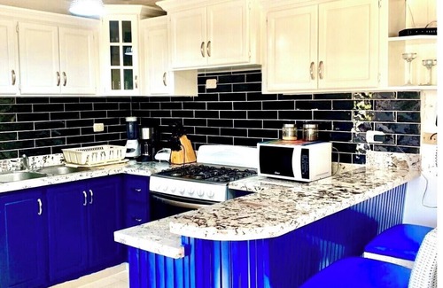 Gregorio Luperon Condo | King Size Finest 3bd Condo| 3A/C| WIFI| TV|Cable !