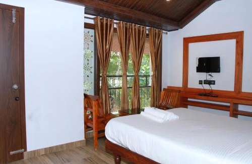 Madikeri Cabin | KINGMAKER'S Plantation with River Stream