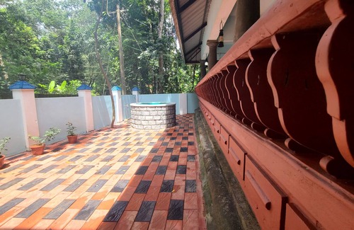 Ettumanoor House | Kizhakkechirayil Homestays, a remote space for the best getaway.
