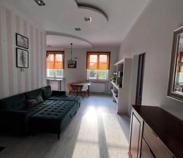 Biskupiec Apartment | Klimatyczne mieszkanie w krainie jezior