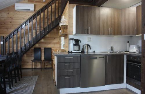 Mikkeli Ski Chalet | Koivurannan lomamökit Kotkanpesä