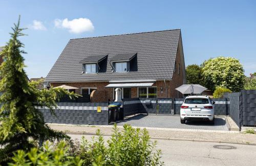 Groemitz House | Komfort-Ferienhaus "Heimathafen" Mittelweg 43c APPARTO Grömitz