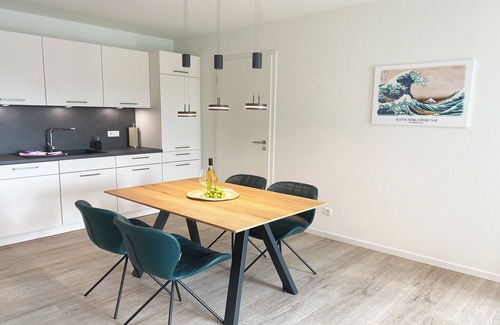 Tossens Apartment | KÜSTE33/44 - Balcony. Sauna. Allergy friendly.