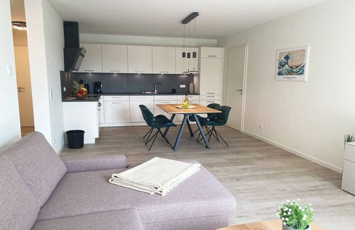 Tossens Apartment | KÜSTE33/44 - Balcony. Sauna. Allergy friendly.