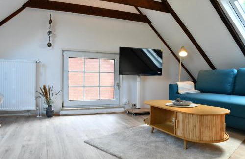 Norden House | Lüttje Koje - Ferienhaus direkt am Deich und dem Meer dahinter