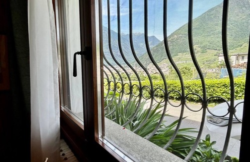 Tirano House | L'atmosfera di uno chalet di montagna alle porte del centro storico di Tirano