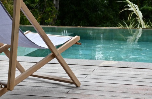 Manapany-les-Bains House | L'océan de Brilune Wake up among the palms, dine under the stars