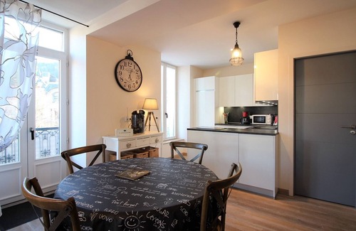La Bourboule Apartment | La Bourboule: Elegant 2-Bedroom Apartment with Balcony, Parking, and Wi-Fi