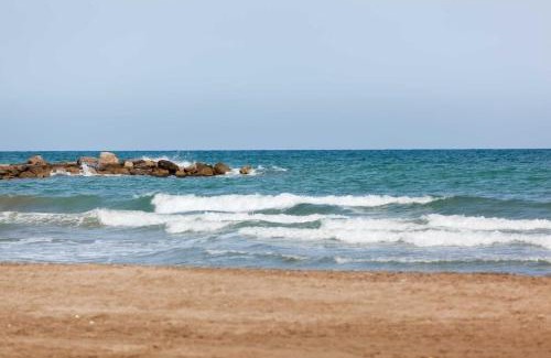 Playa Pobla de Farnals Apartment | La Llar45 , Relájate junto al mar