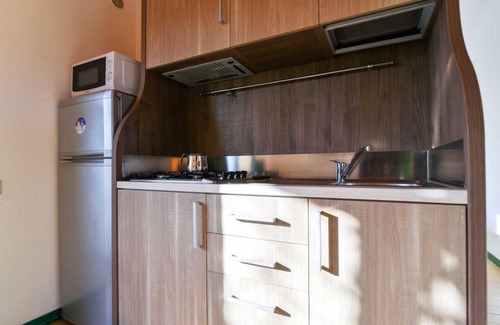 Porto Sant'Elpidio Apartment | La Risacca Family Camping Village three-room apartment Trilo for 4 people