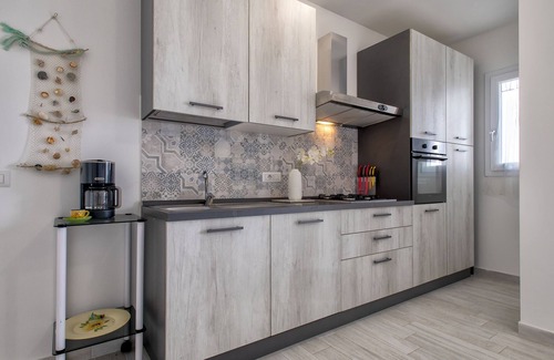 La Muddizza Apartment | La terrazza sulla piscina by Interhome