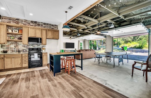 Flint House | Lake Palestine Modern Cottage Game Room, Firepit, Green Kitchen