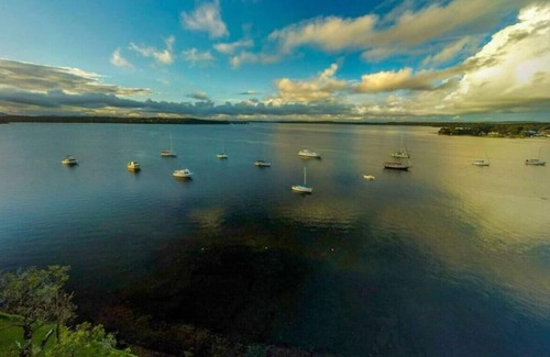 Dora Creek Villa | Lake Palm Retreat - shared pool and waterfront