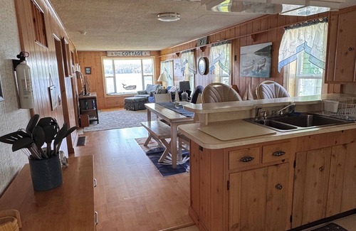 Fountain Cottage | Lakefront cottage with sandy beach and great fishing on Gunn Lake in Fountain MI